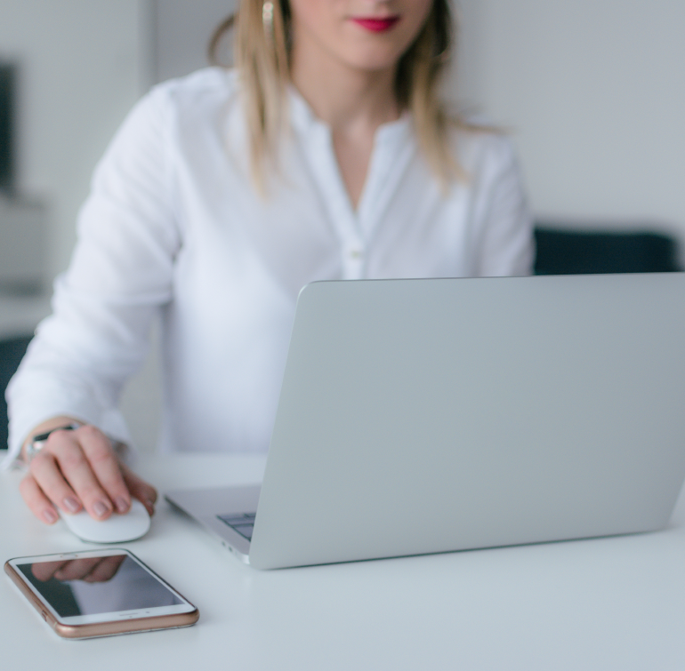 Woman working on her laptop.